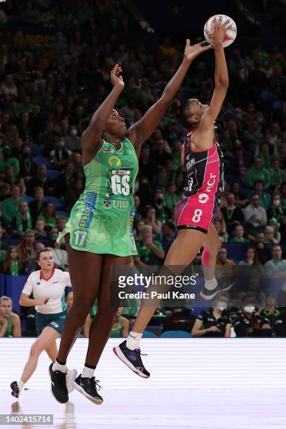 Shamera Sterling of the Thunderbirds intercepts a pass for Jhaniele Fowler of the Fever during the round 14 Super Netball match between West Coast...