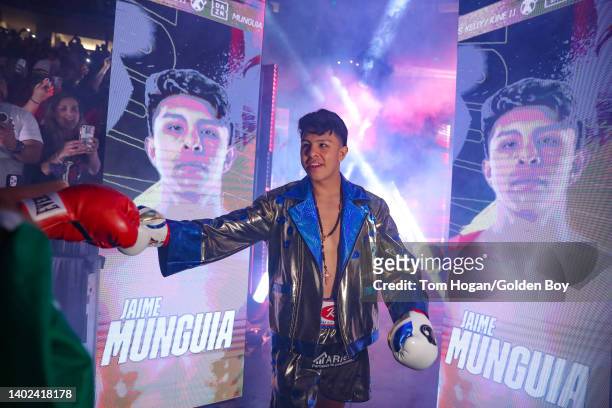 Jaime Munguia makes his entrance for the 12 rounds super middle weight fight against Jimmy Kelly at Honda Center on June 11, 2022 in Anaheim,...