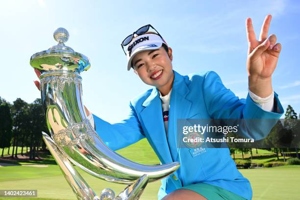 Miyuu Yamashita of Japan poses with the trophy after winning the tournament following the final round of Ai Miyazato Suntory Ladies Open at Rokko...