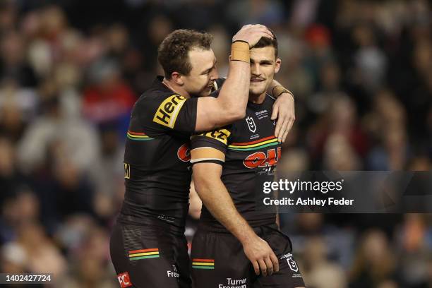 Nathan Cleary of the Panthers celebrates with Mitch Kenny during the round 14 NRL match between the Newcastle Knights and the Penrith Panthers at...