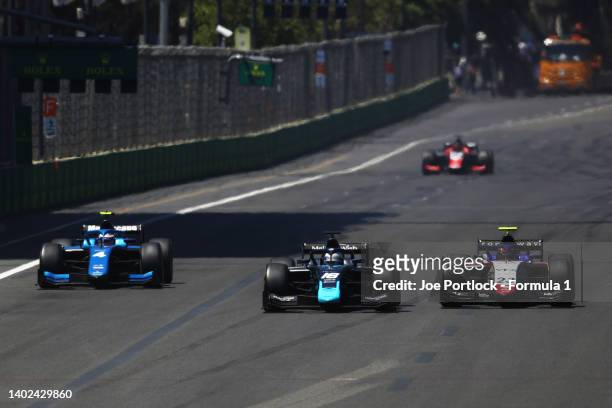 Marino Sato of Japan and Virtuosi Racing , Roy Nissany of Israel and DAMS and Cem Bolukbasi of Turkey and Charouz Racing System battle for track...