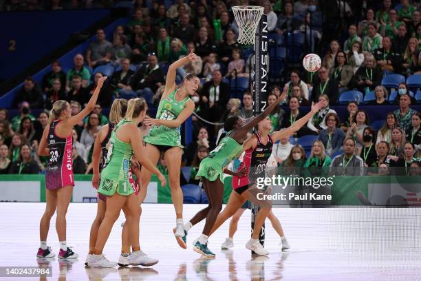 Sunday Aryang of the Fever and Lenize Potgieter of the Thunderbirds contest for the ball during the round 14 Super Netball match between West Coast...