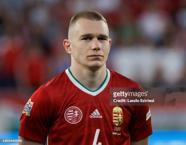 Attila Szalai of Hungary listens to the anthem of Germany prior to the UEFA Nations League League A Group 3 match between Hungary and Germany at...