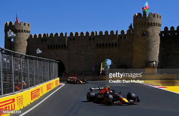 Sergio Perez of Mexico driving the Oracle Red Bull Racing RB18 leads Max Verstappen of the Netherlands driving the Oracle Red Bull Racing RB18 on the...