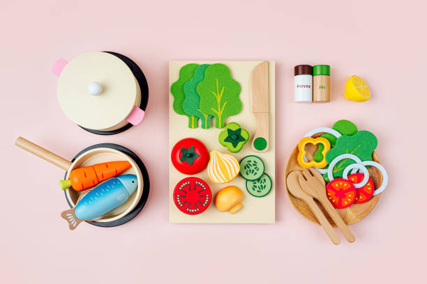 cute kids toys to play in the kitchen. wooden fruit and vegetables play set. educational toys. healthy food concept. learning and development of the child - wooden play sets for kids stock pictures, royalty-free photos & images