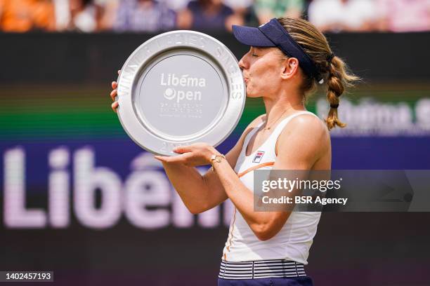 Ekaterina Alexandrova of Russia poses with her trophy after the Womens Singles Final match between Aryna Sabalenka of Belarus and Ekaterina...