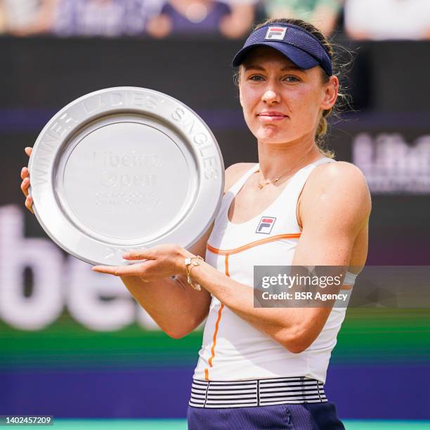 Ekaterina Alexandrova of Russia poses with her trophy after the Womens Singles Final match between Aryna Sabalenka of Belarus and Ekaterina...