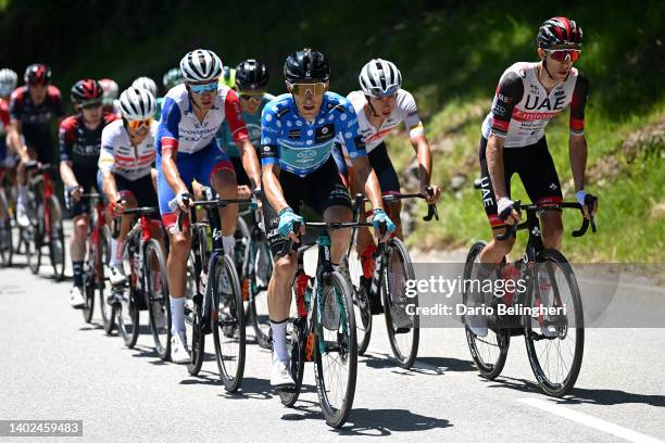 Pierre Rolland of France and Team B&B Hotels P/B KTM Polka Dot Mountain Jersey and George Bennett of New Zealand and UAE Team Emirates compete in the...