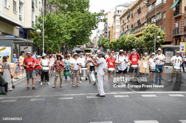 Several people play music during a demonstration to demand the removal of the M-30 flyover and the construction of a park with facilities for the...