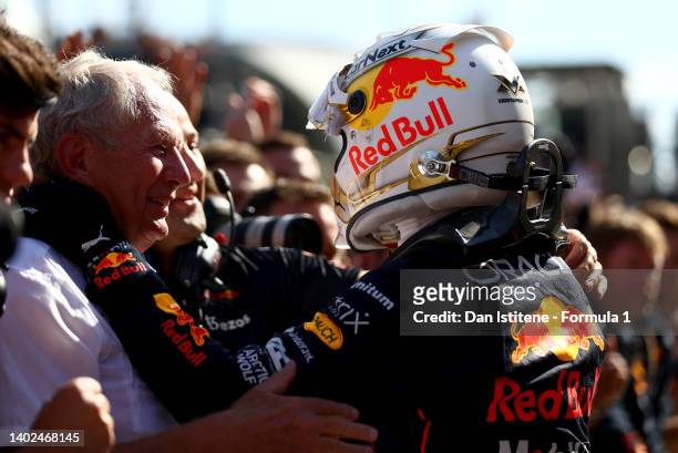 Race winner Max Verstappen of the Netherlands and Oracle Red Bull Racing celebrates with Red Bull Racing Team Consultant Dr Helmut Marko in parc...