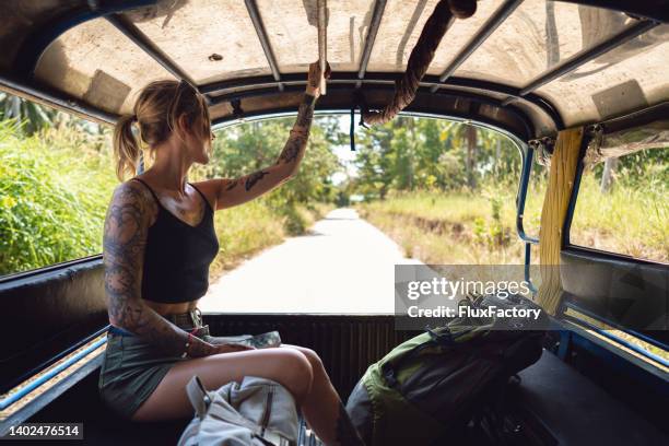 young female tourist, exploring the island with taxi - jungle safari stock pictures, royalty-free photos & images