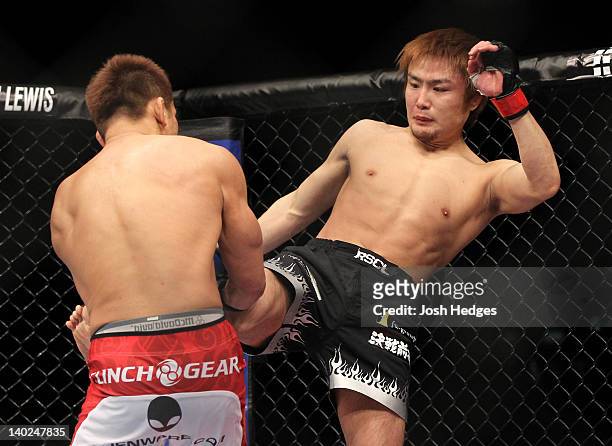 Takanori Gomi kicks Eiji Mitsuoka during the UFC 144 event at Saitama Super Arena on February 26, 2012 in Saitama, Japan.
