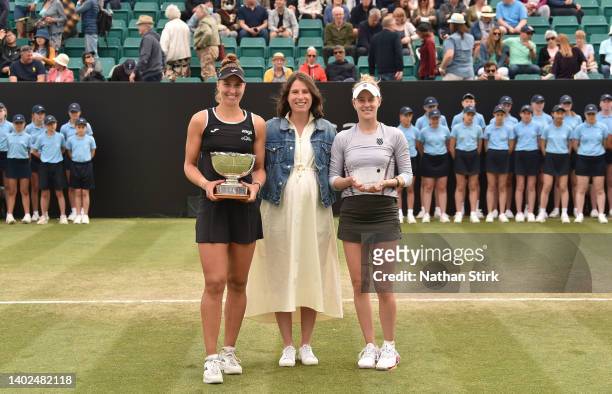 Beatriz Haddad Maia of Brazil poses with the trophy Johanna Konta and Alison Riske after victory in the woman's final during day nine of the Rothesay...