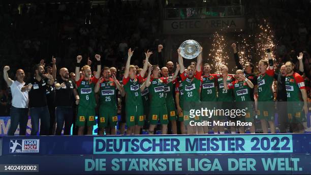 The team of SC Magdeburg celebrate after winning the german handball championship after the LIQUI MOLY HBL match between SC Magdeburg and...