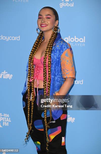 Ella Eyre walks the media line during Capital FM's Summertime Ball at Wembley Stadium on June 12, 2022 in London, England.