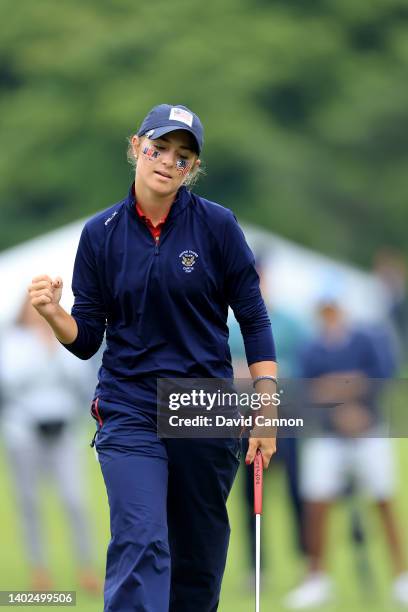 Rachel Kuehn of The United States Team celebrates a birdie putt on the first hole in her match against Caley McGinty during the singles matches on...