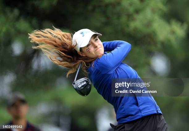 Caley McGinty of The Great Britain and Ireland Team plays her tee shot on the second hole in her match against Rcchel Kuehn during the singles...