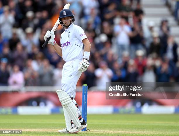 England batsman Joe Root waves his bat after reaching his 150 during day three of the Second Test Match between England and New Zealand at Trent...