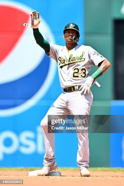 Christian Bethancourt of the Oakland Athletics celebrates after hitting a double during the sixth inning against the Cleveland Guardians at...