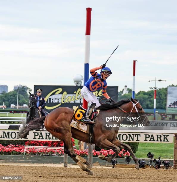 Jockey Irad Ortiz Jr. Celebrates as he crosses the finish line riding Mo Donegal to win the 154th running of the Belmont Stakes at Belmont Park in...