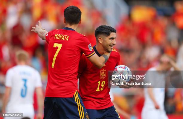 Carlos Soler of Spain celebrates with Alvaro Morata after scoring their team's first goal during the UEFA Nations League League A Group 2 match...