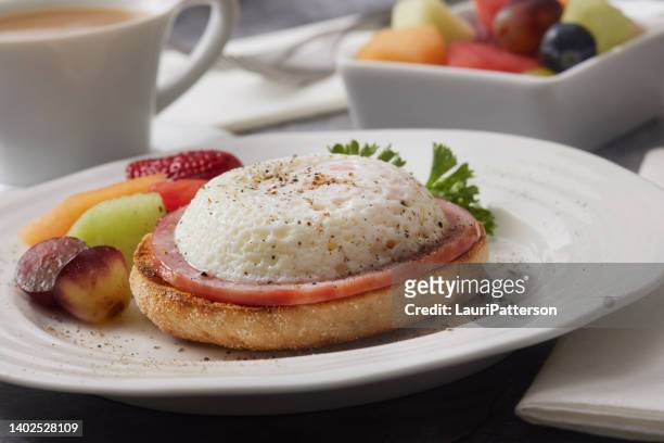 egg poacher eggs benedict - english muffin stock pictures, royalty-free photos & images