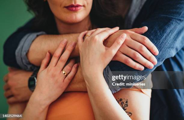 unrecognizable loving couple sharing a romantic moment at home - secret love stock pictures, royalty-free photos & images