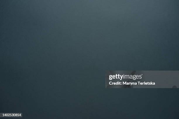 universal colored background. background for text and pictures. paper base. copy space. dark gray background. - grey paper stock pictures, royalty-free photos & images