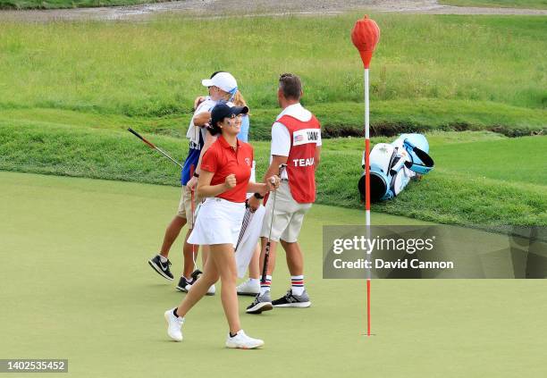 Rose Zhang of The United States Team celebrates winning her match 7&5 on the 13th hole against Louise Duncan during the singles matches on day three...