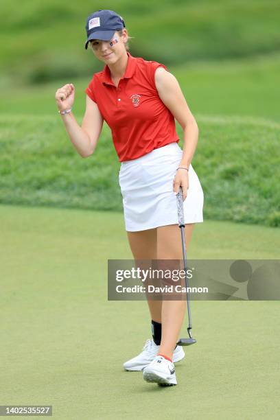 Rachel Heck of The United States Team celebrates a birdie on the 13th hole in her match against Lauren Walsh during the singles matches on day three...