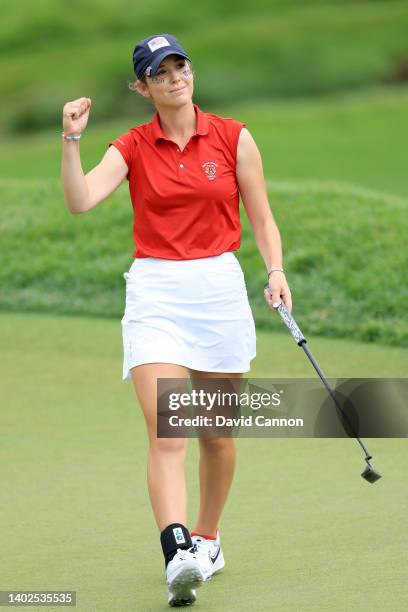 Rachel Heck of The United States Team celebrates a birdie on the 13th hole in her match against Lauren Walsh during the singles matches on day three...