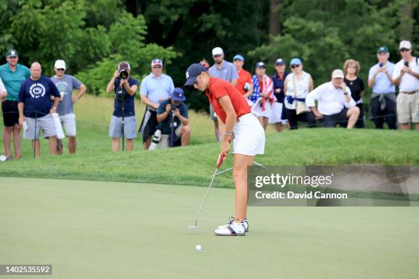 Rachel Kuehn of The United States Team holes a putt to win her match on the 17th hole against Caley McGinty which secured the overall victory fo rthe...