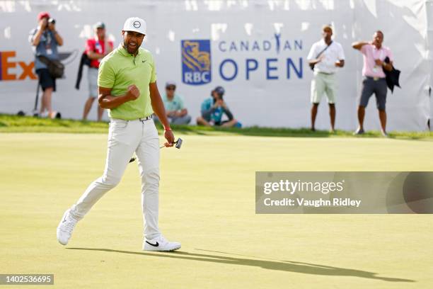 Tony Finau of the United States reacts after making birdie on the 18th green during the final round of the RBC Canadian Open at St. George's Golf and...