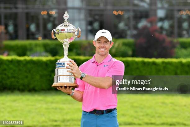 Rory McIlroy of Northern Ireland poses with the trophy after winning the RBC Canadian Open at St. George's Golf and Country Club on June 12, 2022 in...