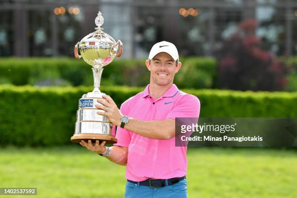Rory McIlroy of Northern Ireland poses with the trophy after winning the RBC Canadian Open at St. George's Golf and Country Club on June 12, 2022 in...
