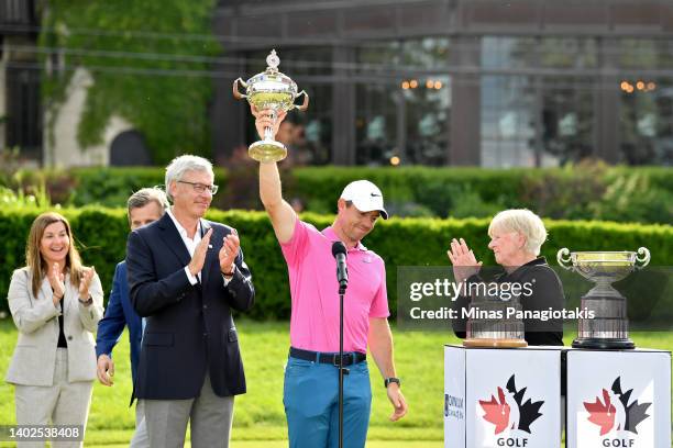 Rory McIlroy of Northern Ireland hoists the trophy after winning the RBC Canadian Open at St. George's Golf and Country Club on June 12, 2022 in...