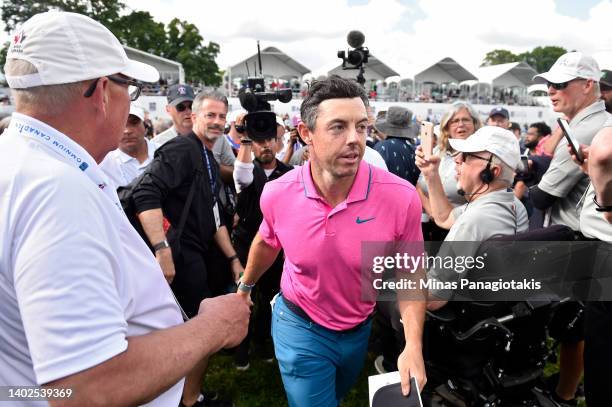 Rory McIlroy of Northern Ireland walks off the 18th green after winning the RBC Canadian Open at St. George's Golf and Country Club on June 12, 2022...