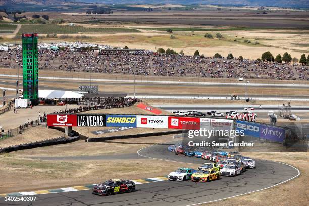 Daniel Suarez, driver of the Onx Homes/Renu Chevrolet, leads the field during the NASCAR Cup Series Toyota/Save Mart 350 at Sonoma Raceway on June...