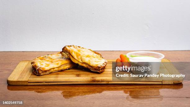 reversed grill cheese - grilled cheese stock pictures, royalty-free photos & images