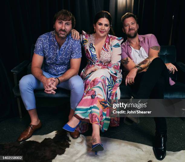 Dave Haywood, Hillary Scott and Charles Kelley of Lady A attend day 4 of The 49th CMA Fest at Nissan Stadium on June 12, 2022 in Nashville, Tennessee.
