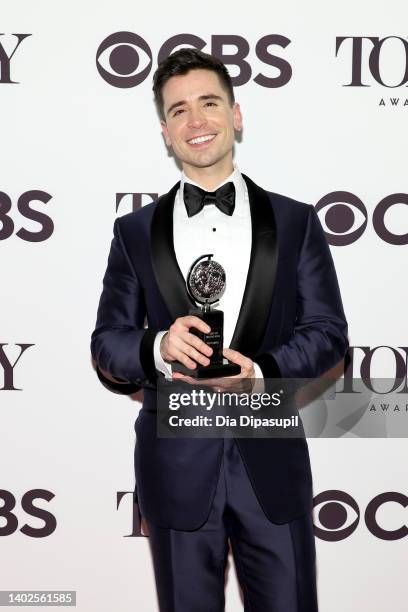 Matt Doyle poses in the press room after winning Best Performance by an Actor in a Featured Role in a Musical for "Company" during the 75th Annual...