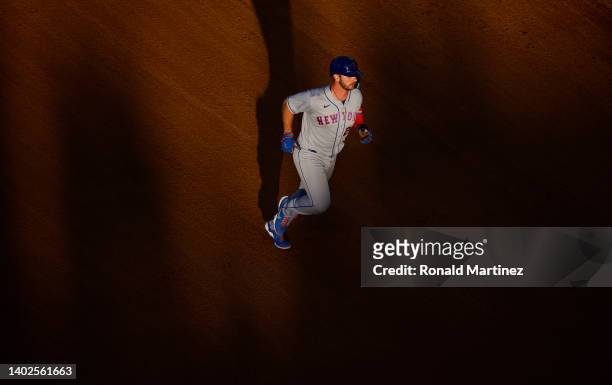 Pete Alonso of the New York Mets runs after hitting a home run against the Los Angeles Angels in the ninth inning at Angel Stadium of Anaheim on June...