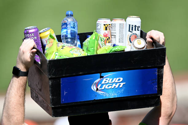Vendor sells beer during the game between the Baltimore Orioles and the Cleveland Guardians at Oriole Park at Camden Yards on June 05, 2022 in...