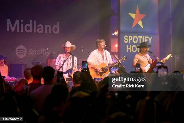 Jess Carson, Mark Wystrach and Cameron Duddy of Midland perform at Spotify House during CMA Fest at Ole Red on June 12, 2022 in Nashville, Tennessee.