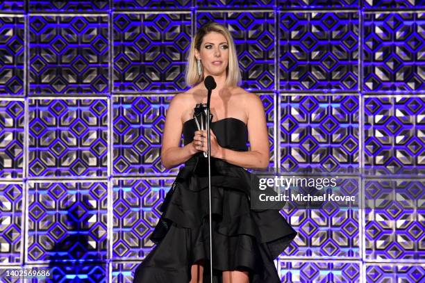 Kelly Rizzo accepts The Impact Award on behalf of the late Bob Saget onstage during the Fourth Annual Critics Choice Real TV Awards at Fairmont...