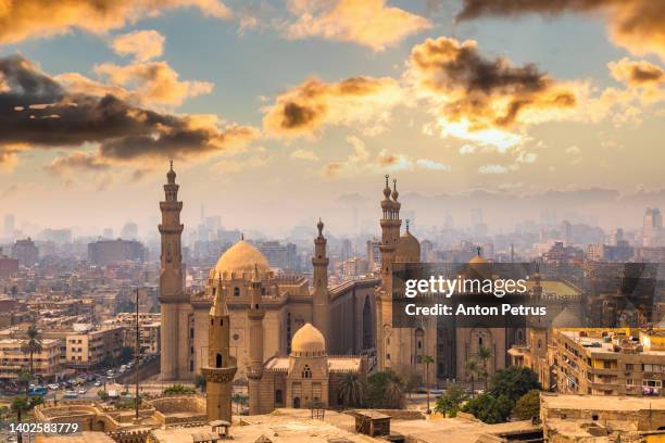the mosque-madrasa of sultan hassan at sunset, cairo citadel, egypt - sultan hassan mosque stock-fotos und bilder