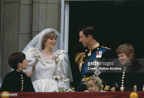 Page boy Edward van Cutsem, Diana, Princess of Wales , wearing an ivory-silk David and Elizabeth Emanuel wedding dress, Charles, Prince of Wales,...