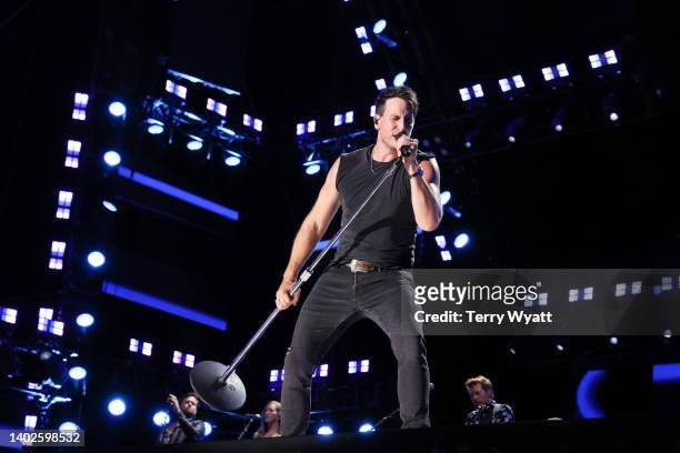 Russell Dickerson performs during day 4 of CMA Fest 2022 at Nissan Stadium on June 12, 2022 in Nashville, Tennessee.