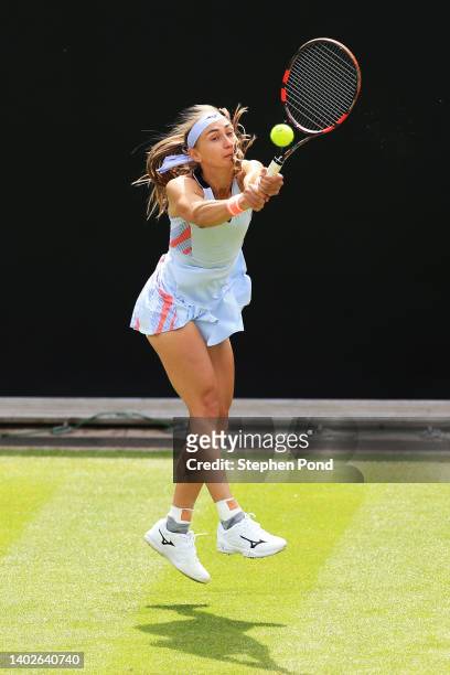 Aleksandra Krunic of Serbia plays a backhand in their Women's Singles First Round match against Petra Martic of Croatia during Day Three of the...