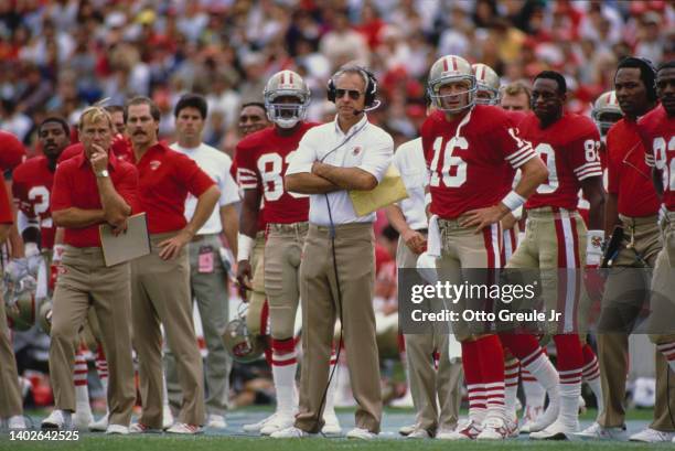 Head Coach George Seifert and Joe Montana, Quarterback for the San Francisco 49ers look on from the side line during the National Football Conference...